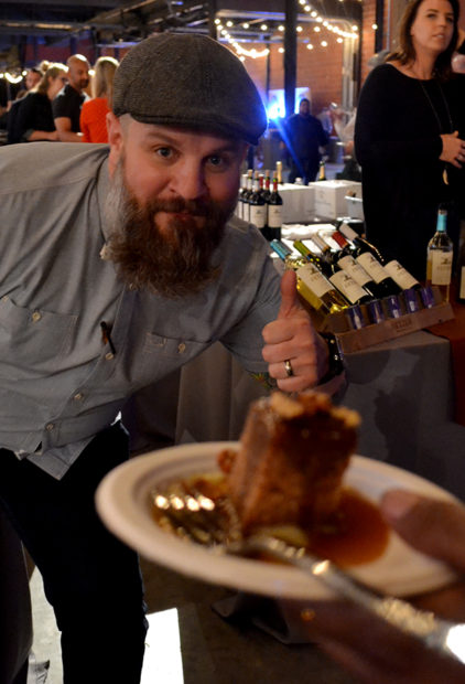 Giving that thumbs up for the delicious whiskey cake that only Whiskey Cake can make.