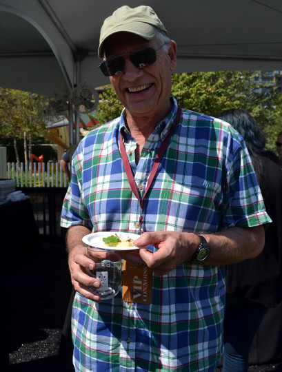 A happy event goer enjoyig his time at the Grand Tasting Event.
